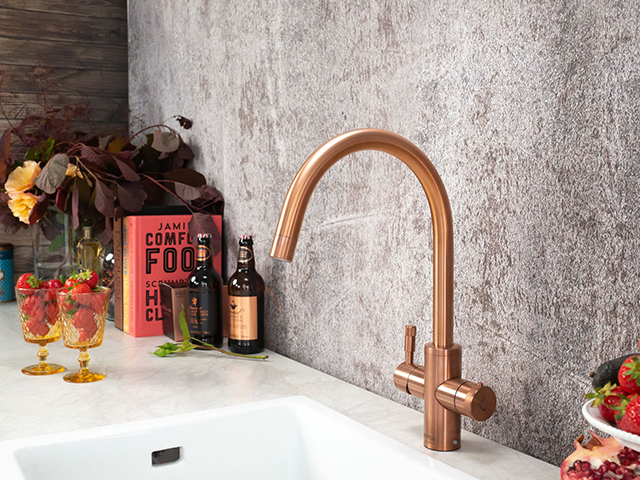Instant hot water tap in a copper finish from Qettle 
