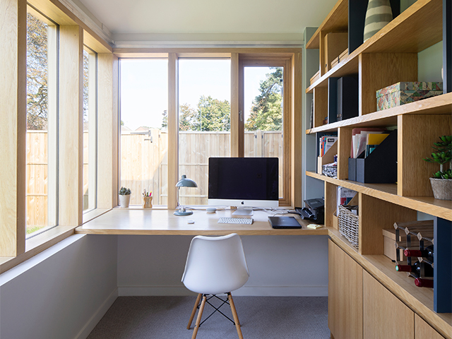 A home office in the garden with build-in storage and desk