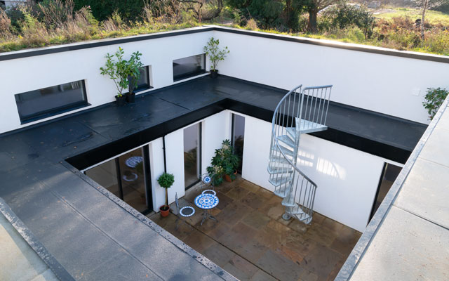 Overhead view of the courtyard garden at the centre of the Grand Designs self-heating house