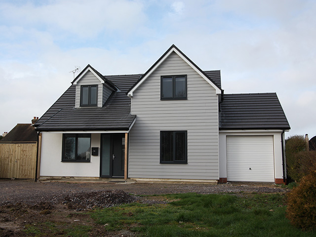 after image of cottage extended and given a new england style look - home improvements - grand designs