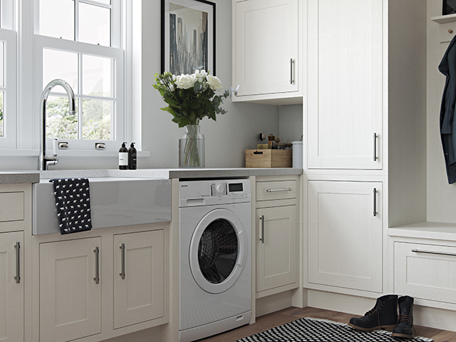 Laundry room with cupboard storage and sink, granddesignsmagazine.com