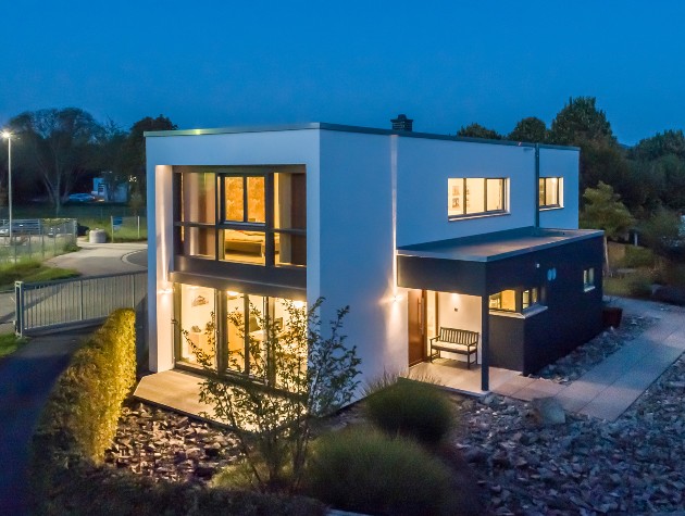 White square Box show home with expansive glazing