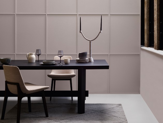 modern dining table and chairs on patterned rug