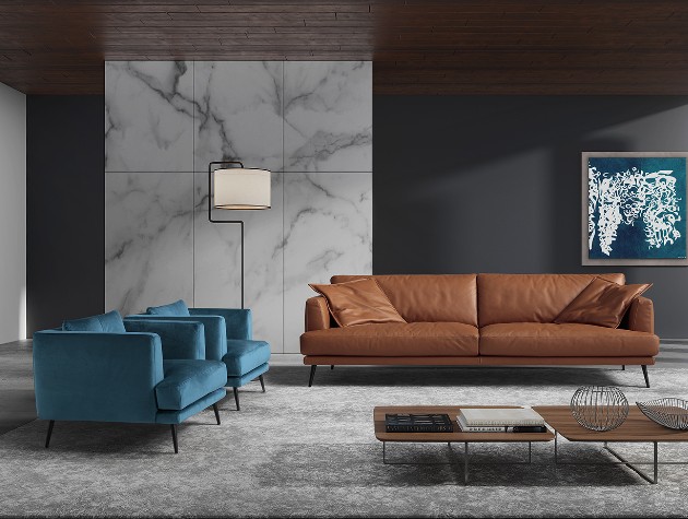 spacious modern living room with teal square velvet armchairs and tan leather Ego Italiano Sophia sofa