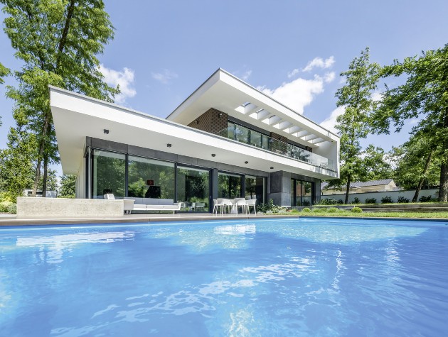 swimming pool in front of modern design house