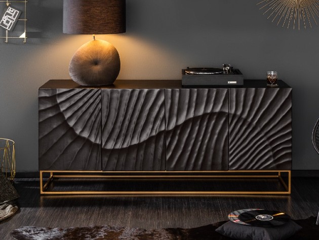 black patterned sideboard with gold legs and turntable on top