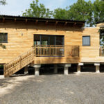 Exterior of timber house on stilits grand designs house