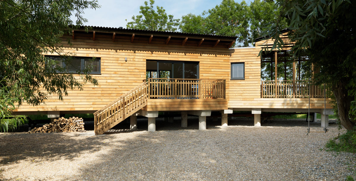 Exterior of timber house on stilits grand designs house