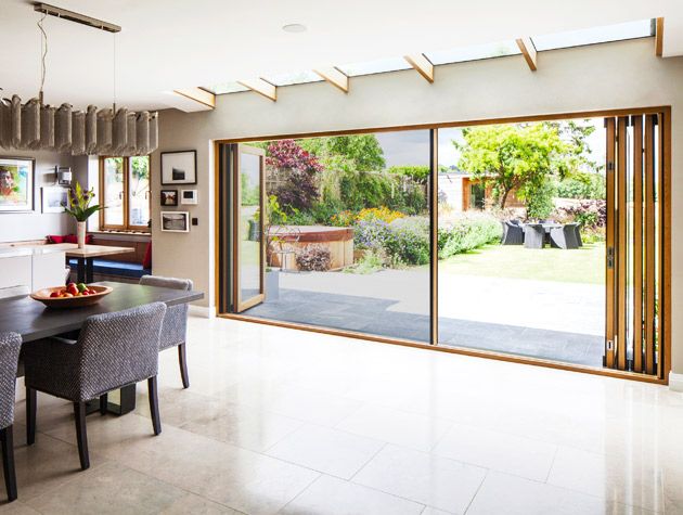 Bi fold doors on a kitchen extension leading out onto the garden 