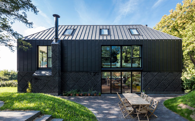 Side view of the exterior of the Grand Designs house in Horsham