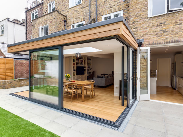 Open-corner extension with floor-to-ceiling glazing