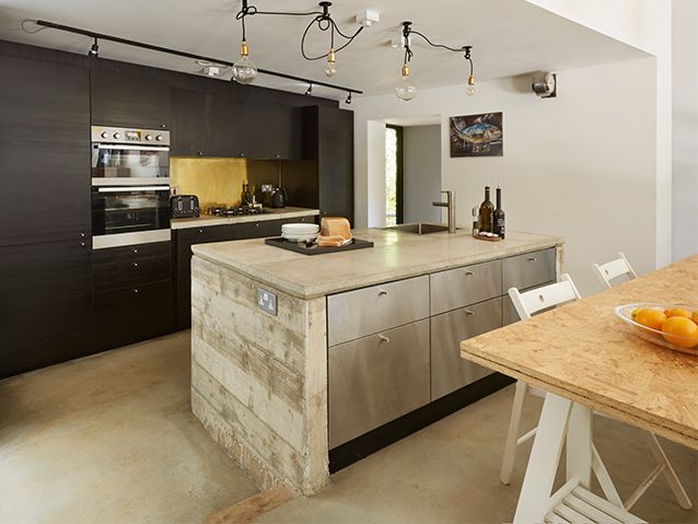 The Grand Designs Billericay home in the woods in Essex has a mix of materials in the kitchen
