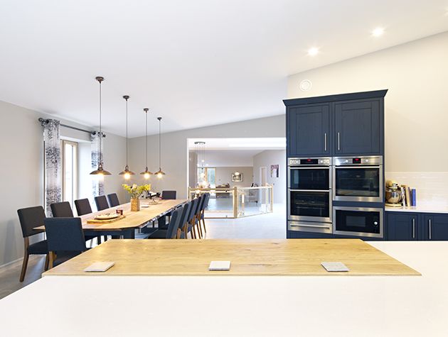 open plan living room and kitchen in a large, modern detached eco home