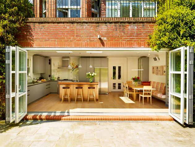 rear kitchen extension with bi-fold doors, kitchen island and dining area