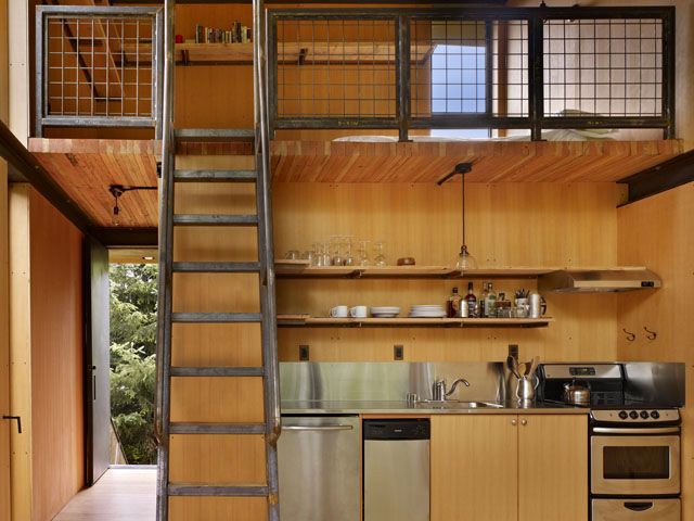 mezzanine design in Sol Duc Cabin by Olson Kundig Architects, photo by Benjamin Benschneider