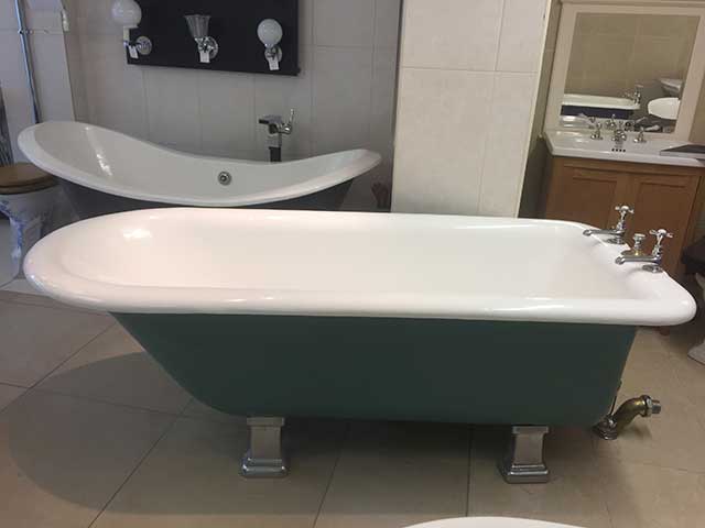 Green freestanding bath from salvaged home materials