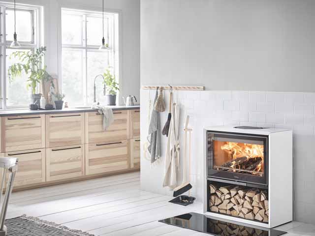 White Contura wood burning stove in modern neutral kitchen
