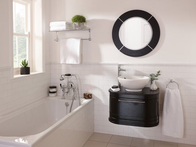 a black, wall hung Imperial Carlyon Roseland Drawer sink in a small bathroom