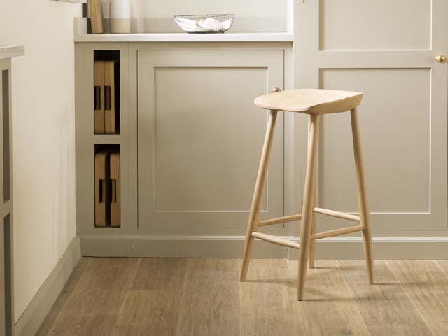 light wood flooring in a kitchen by floors of stone