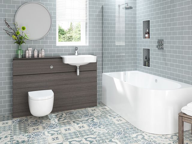 waters baths of ashbourne flow bath in a grey tile bathroom