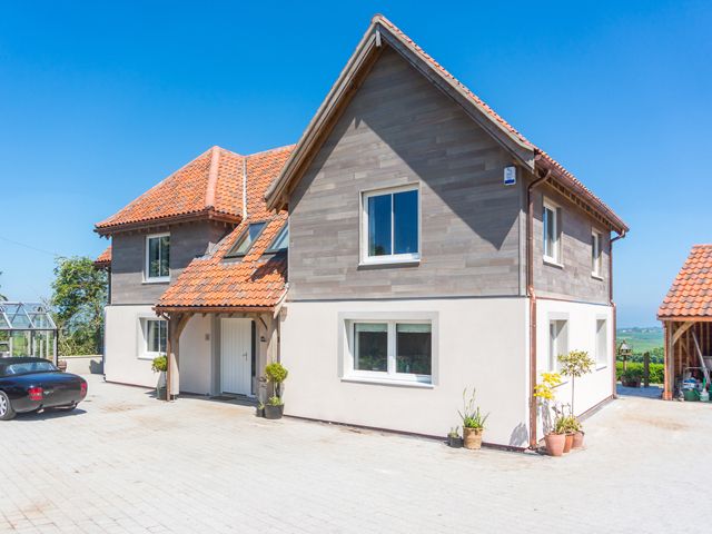 hilltop house is a passivhaus certified home with an oak frame, based in the uk Green building ideas