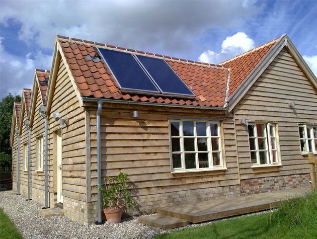 house with greenonetec ST solar system panels