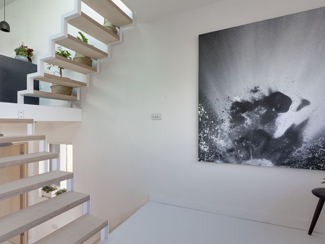 bespoke cantilevered staircase in Joe and Lina's affordable Passivhaus in London