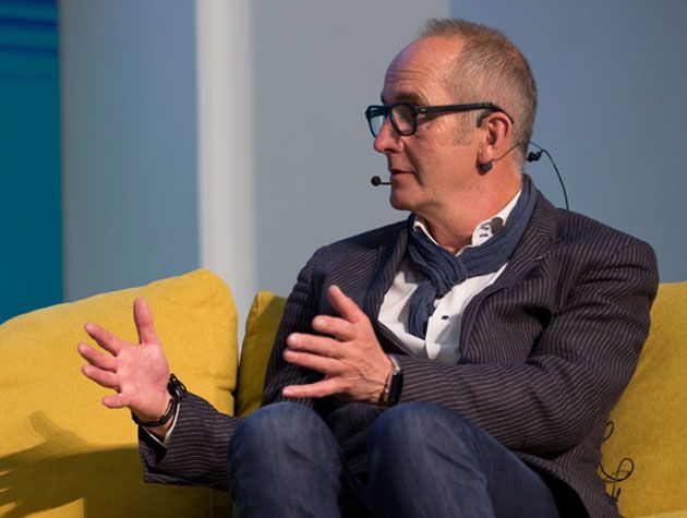 grand designs presenter kevin mccloud on stage at grand designs live london 2018