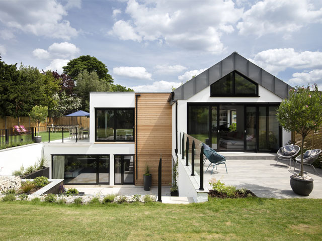 Steps lead down to the patio garden of Elinor and Born's family self build. Photo: David Giles