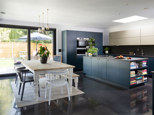 The modern kitchen includes a mix of new and second-hand buys. Photo: David Giles