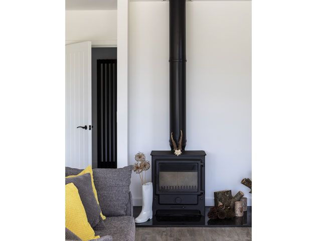 Woodburner in farmhouse - granddesignsmagazine.com