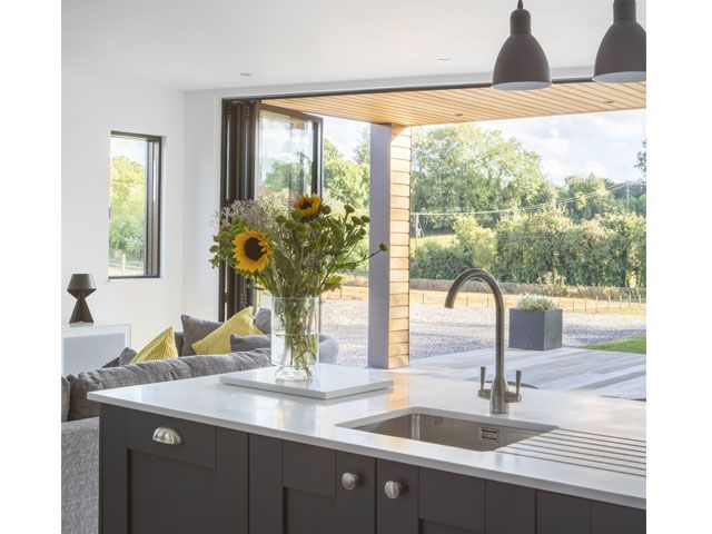 Grand Designs TV house from the 2018 series in Leominster, Herefordshire with open plan living area kitchen with grey sink unit -tv-houses-granddesignsmagazine.com