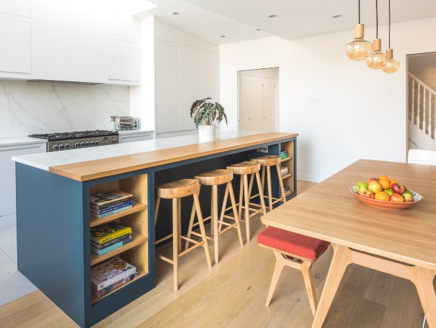 a kitchen with island seating and dining table copy