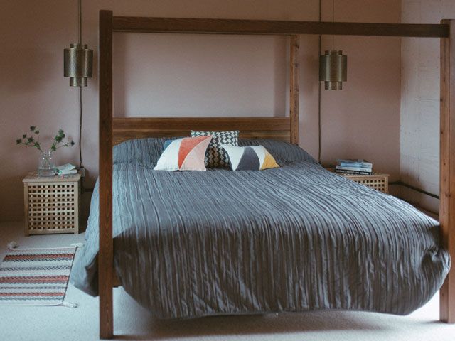 A four poster bed in the bedroom of u- build box house featured on my grand design on Channel 4 by studio bark