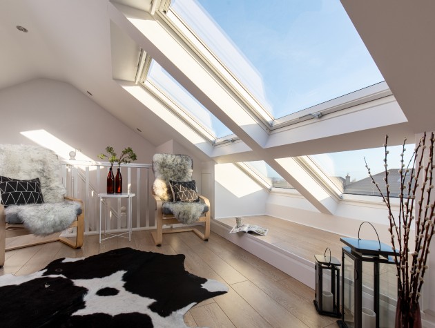 converted loft with velux windows and cowhide rug copy