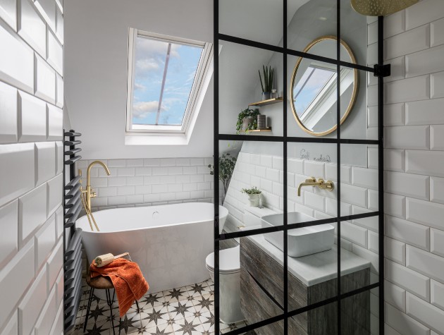 en suite bathroom with bath in converted loft