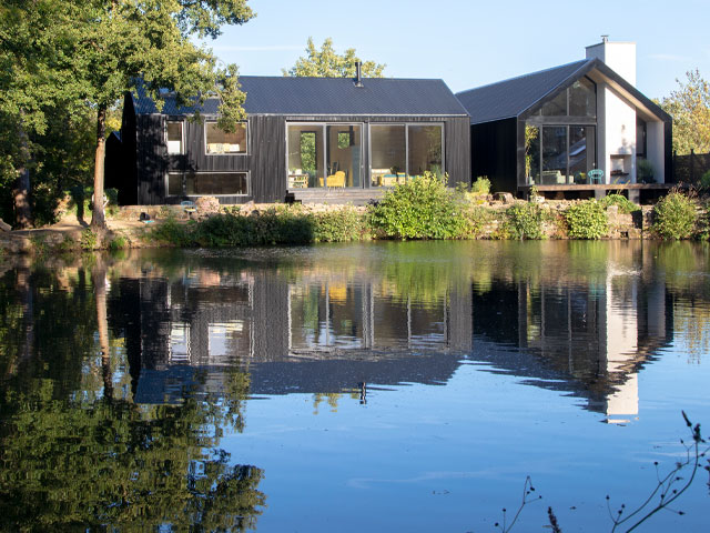 This pair of corrugated steel-clad homes were built on a postindustrial plot spotted on an auction site