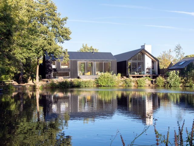 self build house by a river