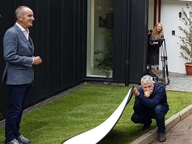 Kevin McCloud filming Grand Designs behind the scenes shot with crew in 2015