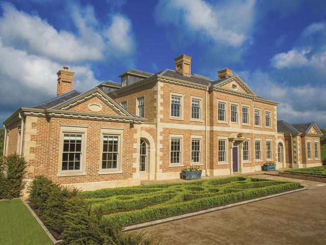Hulmefield Hall is a brick new build designed in the style of a stately hall