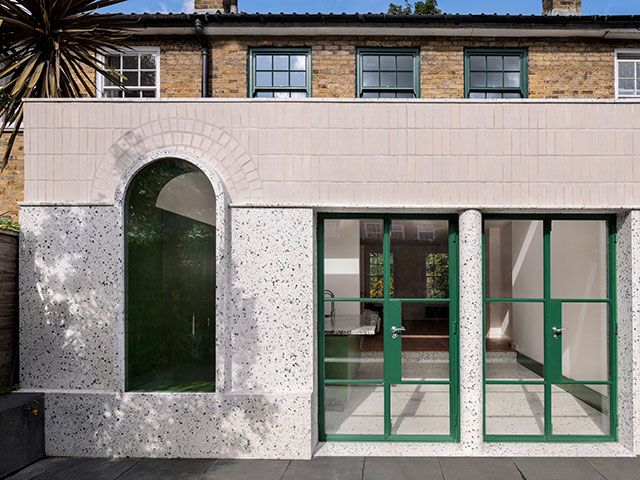 creative extension with terrazzo walls and green aluminium doors - grand designs 
