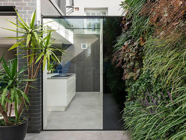 modern kitchen extension with exterior plant wall - luke arthur wells - grand designs