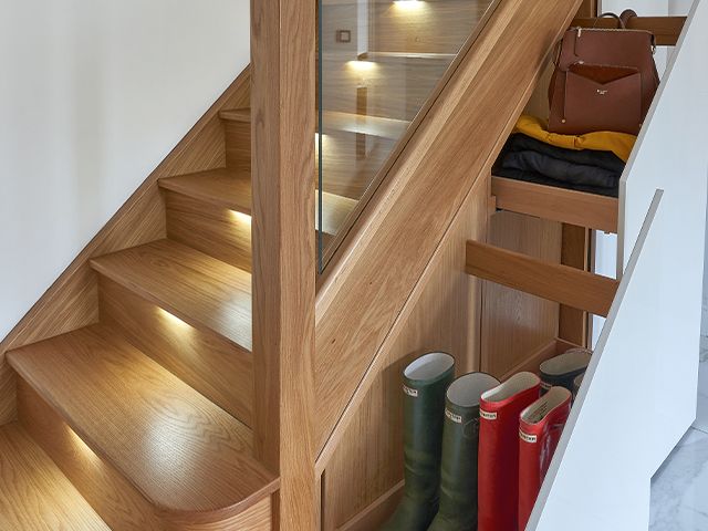 under stairs built in storage - buyer's guide to built-in storage - home improvements - granddesignsmagazine.com