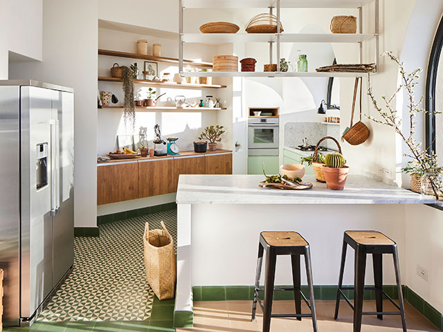 contemporary kitchen in a converted monastery with green tiles - grand designs