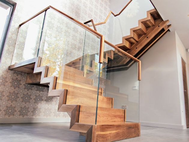 Staircase in a modern house with wallpaper