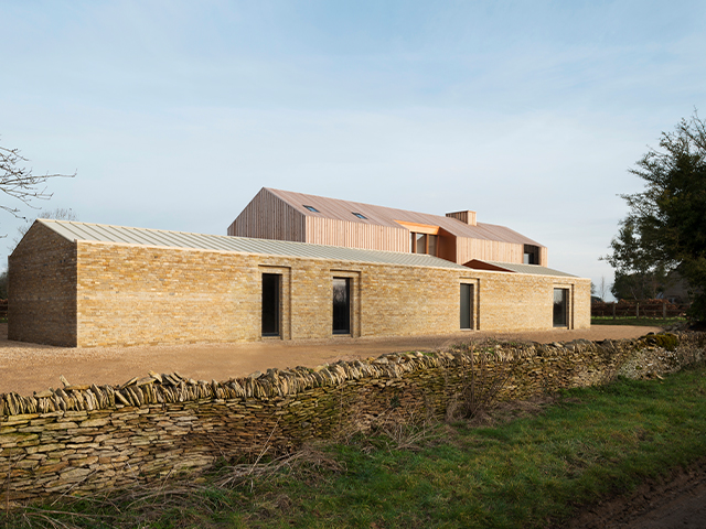 beige stone exterior property - 7 striking stone houses - self build homes - granddesignsmagazine.com