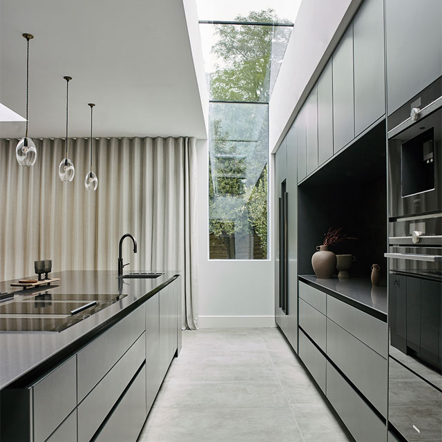 atrium-style glazing connects old and new in a contemporary extension