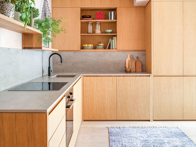responsibly sourced timber in a bright modern kitchen with plants and bespoke joinery