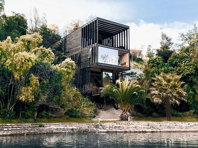 modern timber clad house with open front on hillside in chile - grand designs 