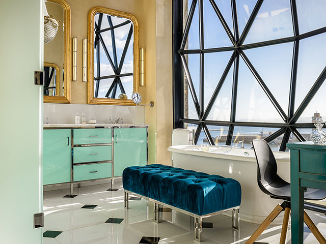 silo hotel with foot stool and vanity - grand designs